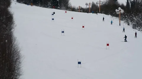 Children's Alpine skiing competitions in the open air in winter Stock Footage 102481533
