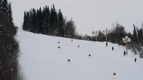 Children's Alpine skiing competitions in the open air in winter Stock Footage 102481573