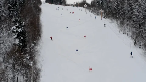 Children's Alpine skiing competitions in the open air in winter Video stock 104701636