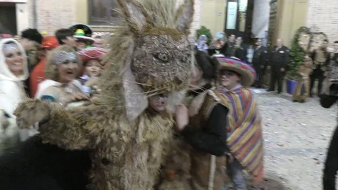 Children's beast Mussona, during Carnival of Aguilas, Spain Видео 97911092