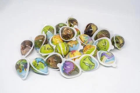 Children's candy with packaging of various kinds of dinosaurs Stock Photos