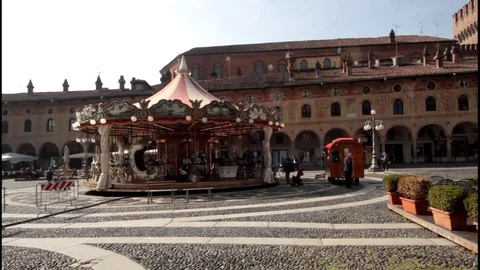 Children's carousel in the Ducale square in Vigevano Stock-Footage 88624663