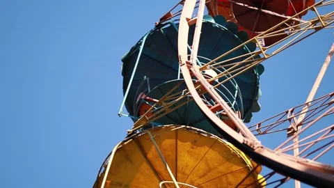 Children's carousel. Ferris wheel. Carousel close up. Stock Footage 165416120