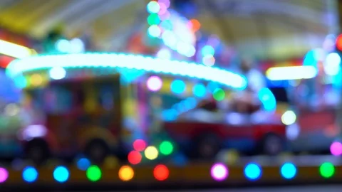 Children's carousel at night with blinking lights. blurry video. Stock-Footage 122223096