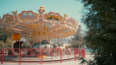 Children's carousel in the park Stock Footage 61887337