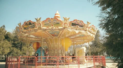 Children's carousel in the park Stock Footage 61887601