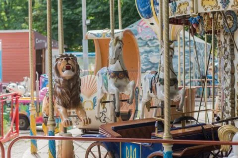Children's carousel in the park Stock Photos
