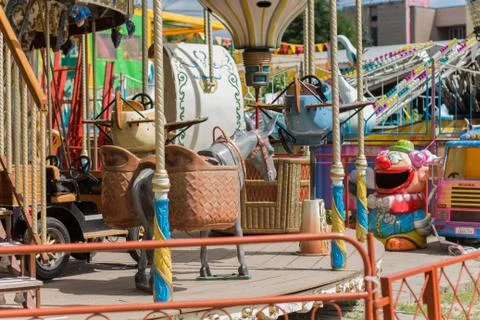 Children's carousel in the park Stock Photos