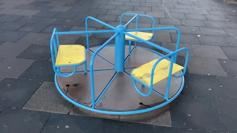 Children's carousel on a playground Stock Footage 254236519