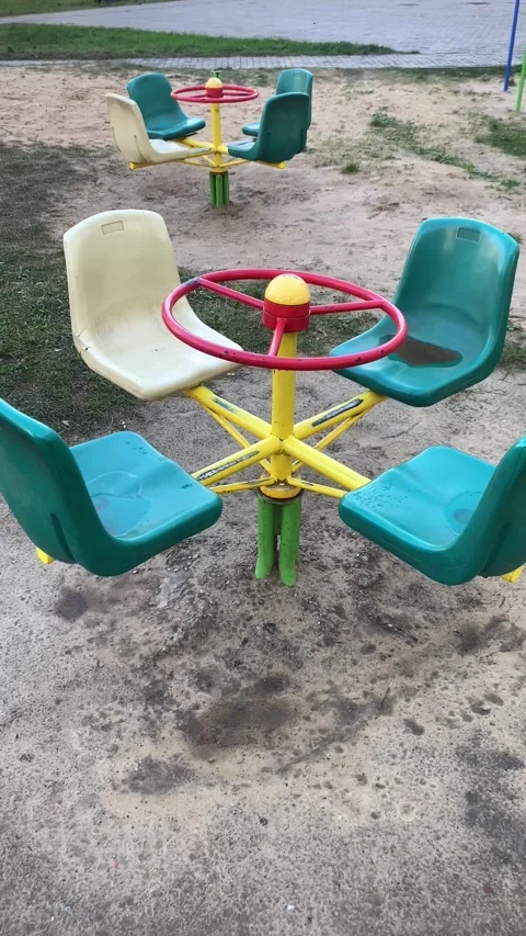 Children's carousel on the playground. Vertical video Stock Footage 287942179