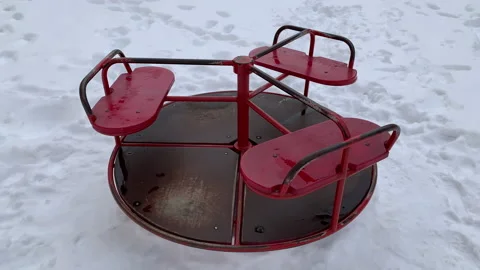 Children's carousel on a winter day Stock Footage 148991470