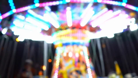 Children's christmass carousel at night with blinking lights. blurry video Stock-Footage 118464213