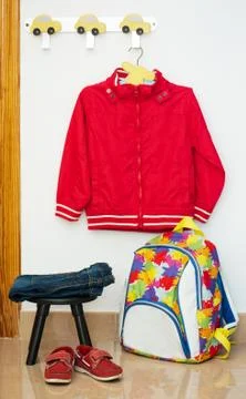 Children's clothes, backpack, shoes Stock Photos