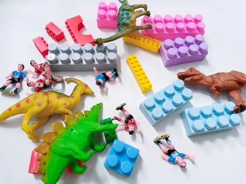 Children's colored plastic Block Bricks with dinosaur Toy Figure. Colorful .. Stock Photos