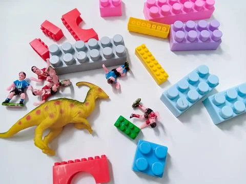 Children's colored plastic Block Bricks with dinosaur Toy Figure. Colorful .. Stock Photos
