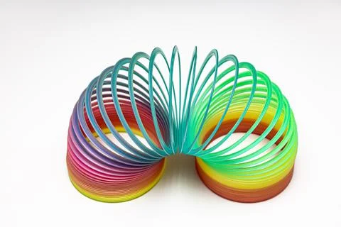 Children's colored spring with rings of different colors Stock Photos
