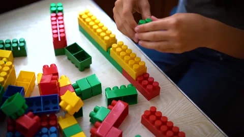 Children's constructor on table in the play area Stock Footage 142382939