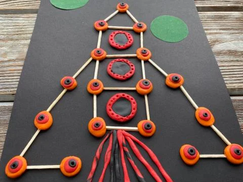 Children's creativity, rocket in space, from plasticine and matches, Stock Photos