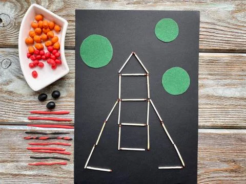 Children's creativity, rocket in space, from plasticine and matches, Stock Photos