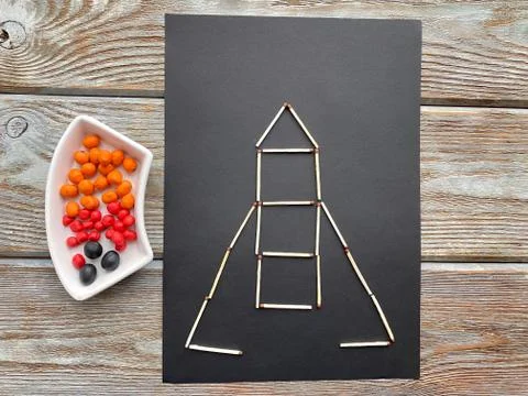 Children's creativity, rocket in space, from plasticine and matches, Stock Photos