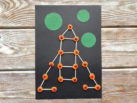 Children's creativity, rocket in space, from plasticine and matches, Stock Photos