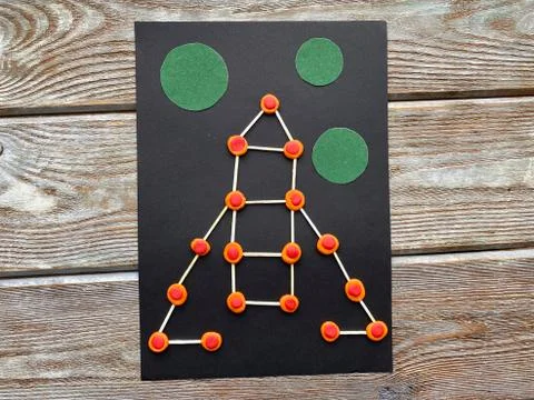 Children's creativity, rocket in space, from plasticine and matches, Stock Photos