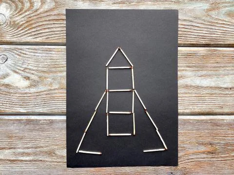 Children's creativity, rocket in space, from plasticine and matches, Stock Photos
