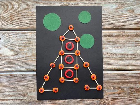 Children's creativity, rocket in space, from plasticine and matches, Stock Photos
