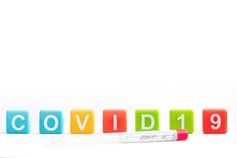 Children's cubes with the inscription covid-19. Test for coronavirus. Stock Photos