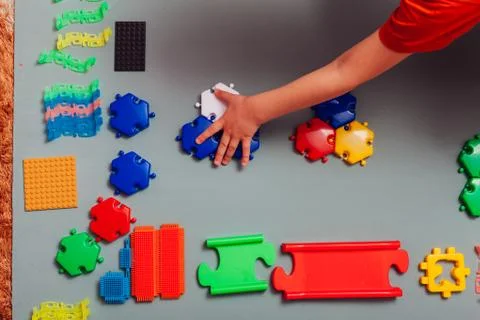 Children's developing game designer for home on a gray background Stock Photos