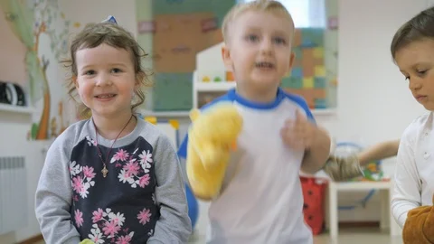 Children's developing a game room. Emotions of young children during Stock Footage 89551152