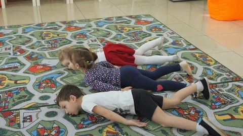 Children's developing a game room. Emotions of young children during Stock Footage 89669669