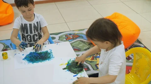 Children's developing a game room. Emotions of young children during Stock Footage 90015875