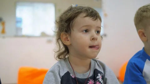 Children's developing a game room. Emotions of young children during Stock Footage 90017616