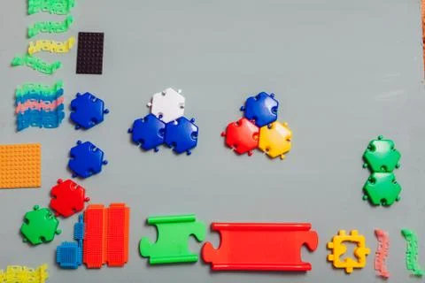 Children's developing games collect designer on a gray background Stock Photos