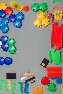 Children's developing games collect designer on a gray background Stock Photos