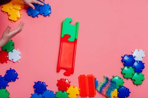 Children's developing games collect designer on a pink background Stockfoto's