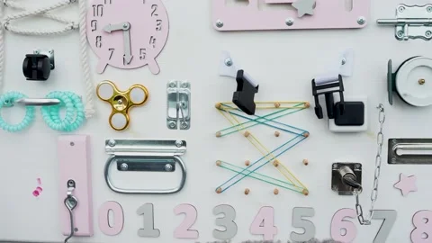 Children's educational Board, various tactile elements Stock Footage 135388162