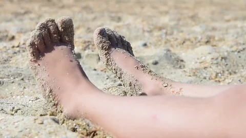 Children's feet in the sand Stock Footage 79359611