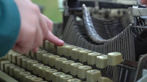Children's fingers typing on a typewriter Stock Footage 136876116