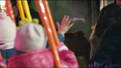Childrens Flying Hands in Carousel by Night Stock Footage 121549048