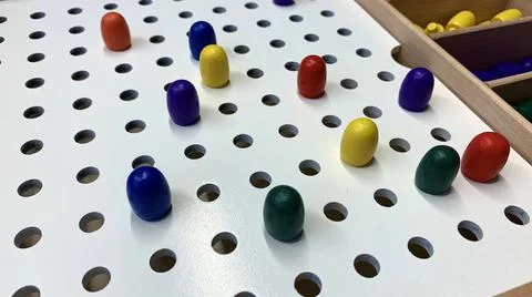 Children's game for the development of fine motor skills Stock Photos
