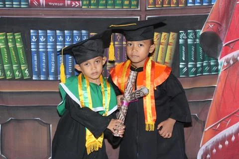Children's graduation process, two good friends Stock Photos