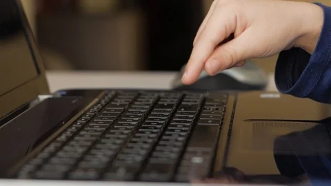 Children's hand prints on the keyboard Stock Footage 98134877