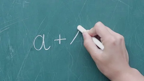 Children's hand write maths by white chalk gree board Video stock 251558719