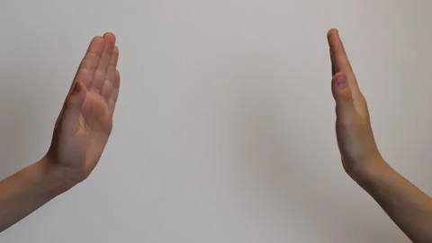 Children's hands approvingly strike each other's palms, children's friendsh.. Stock Footage 243911192
