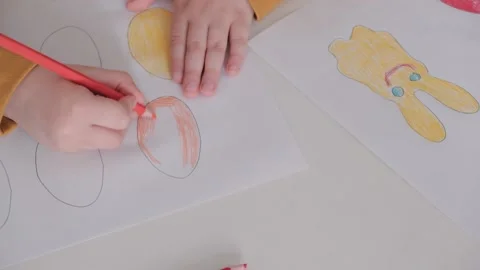 Children's hands are drawing. Preparing for Easter Stock Footage 148787629