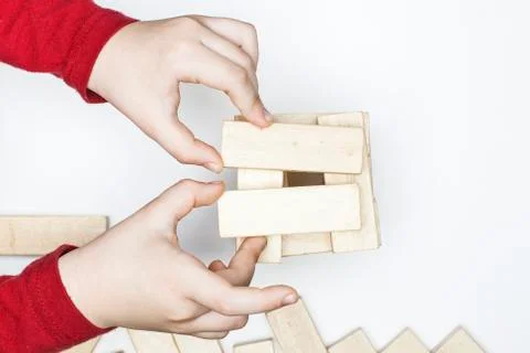 Children's hands build Stock Photos