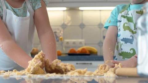 Children's hands in the dough Stock Footage 124943056