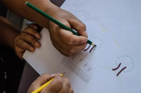 Children's hands drawing Stock Photos